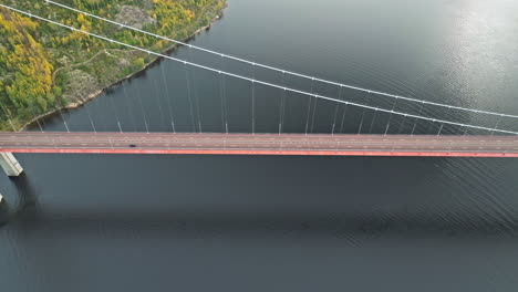 hogakustenbron concrete bridge over calm ocean during autumn in sweden