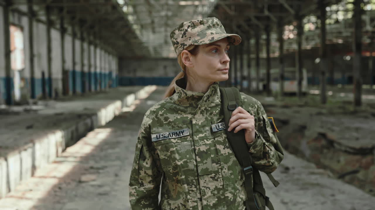 Woman Soldier in Abandoned Factory