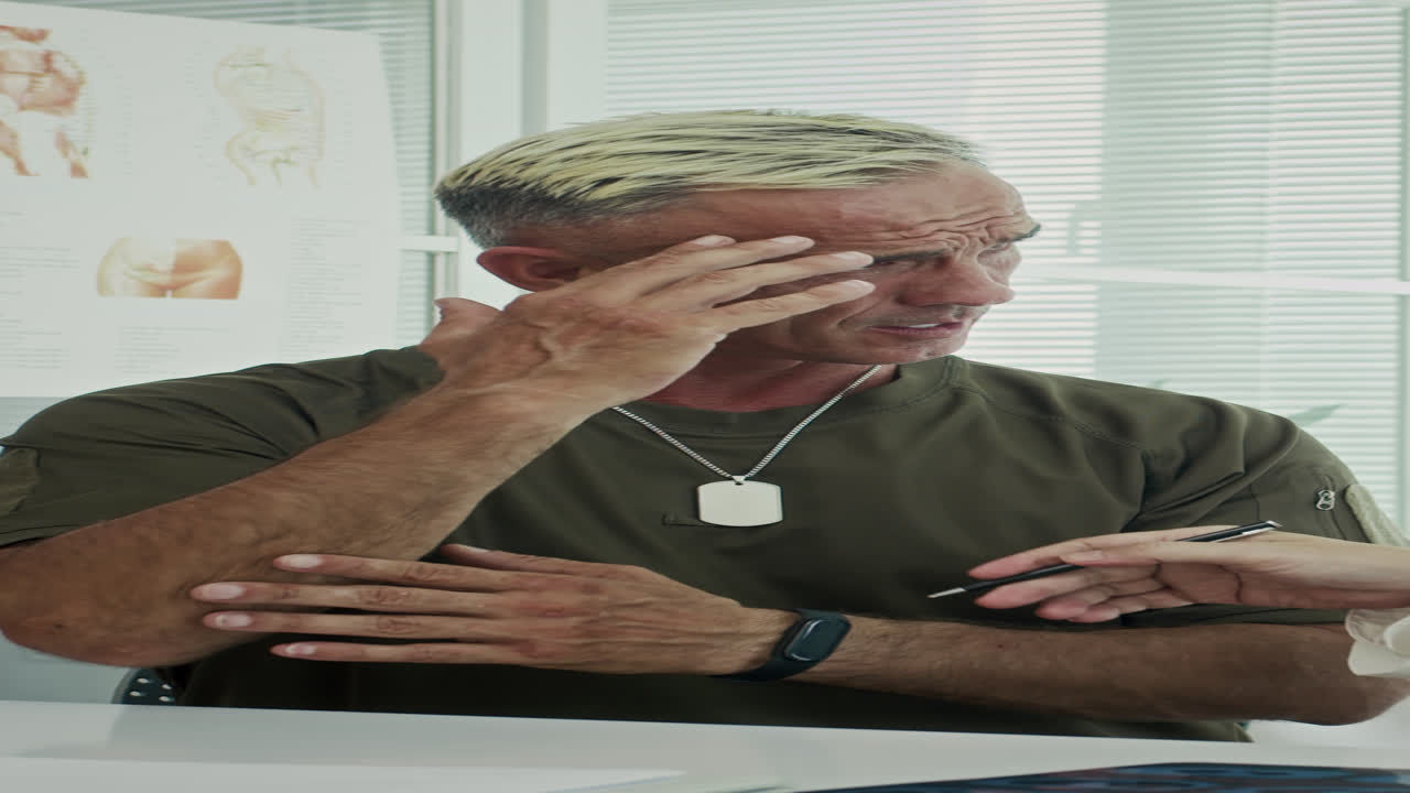 Ex-soldier with Headache Visiting Hospital to Get Treatment