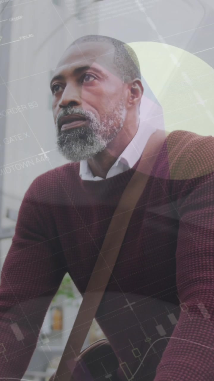 Animation of infographic interface over african american man riding bicycle on street in city