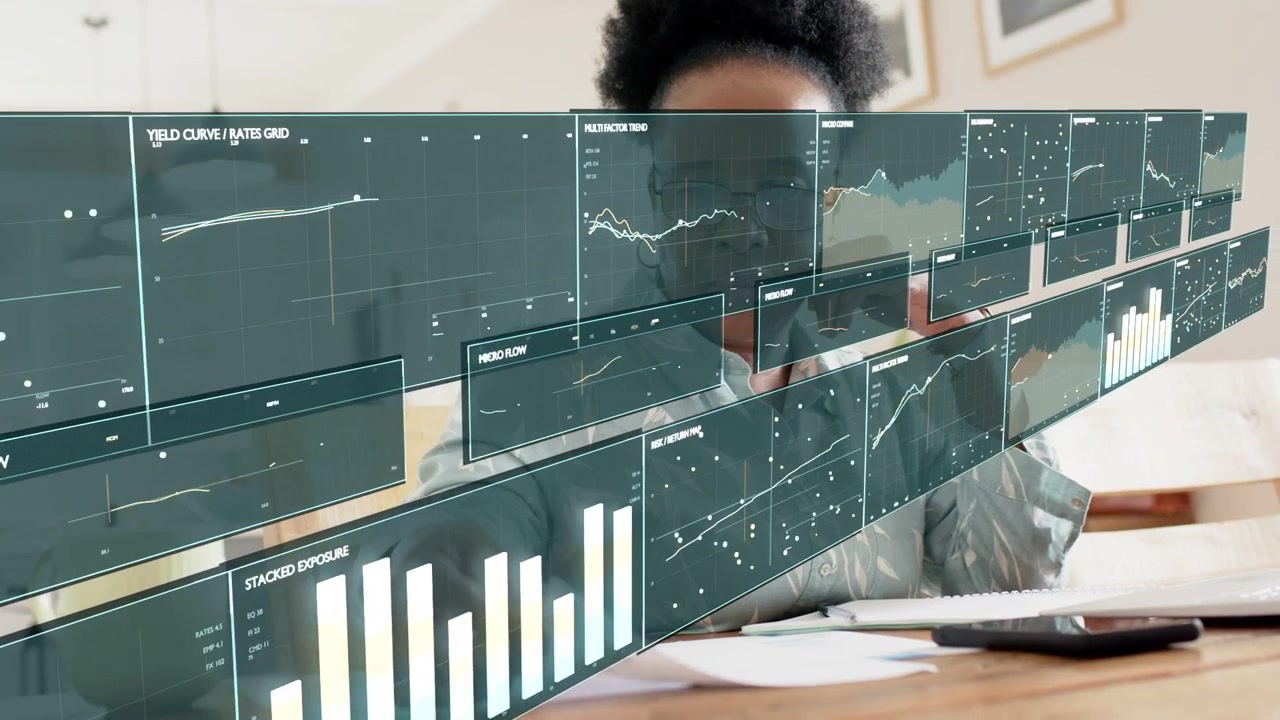 Mature woman tapping floating data panels appearing at table, analyzing shifting financial charts
