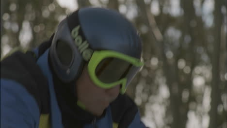 a skier prepares to take off down a slope