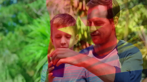 father and son with drink outdoors, vietnam flag animation overlaying scene