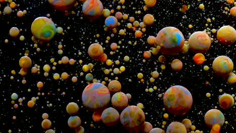 slow motion bright colors bubbles oil beautiful paint surface universe color moving multicolored closeup. acrylic paint. fantastic surface. abstract colorful paint fantastic structure colorful bubbles