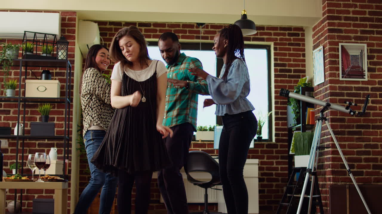 BIPOC school colleagues organizing apartment party, enthusiastically dancing to electronic songs