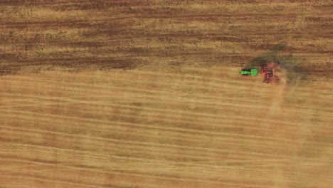 Aerial view of tractor plowing a field