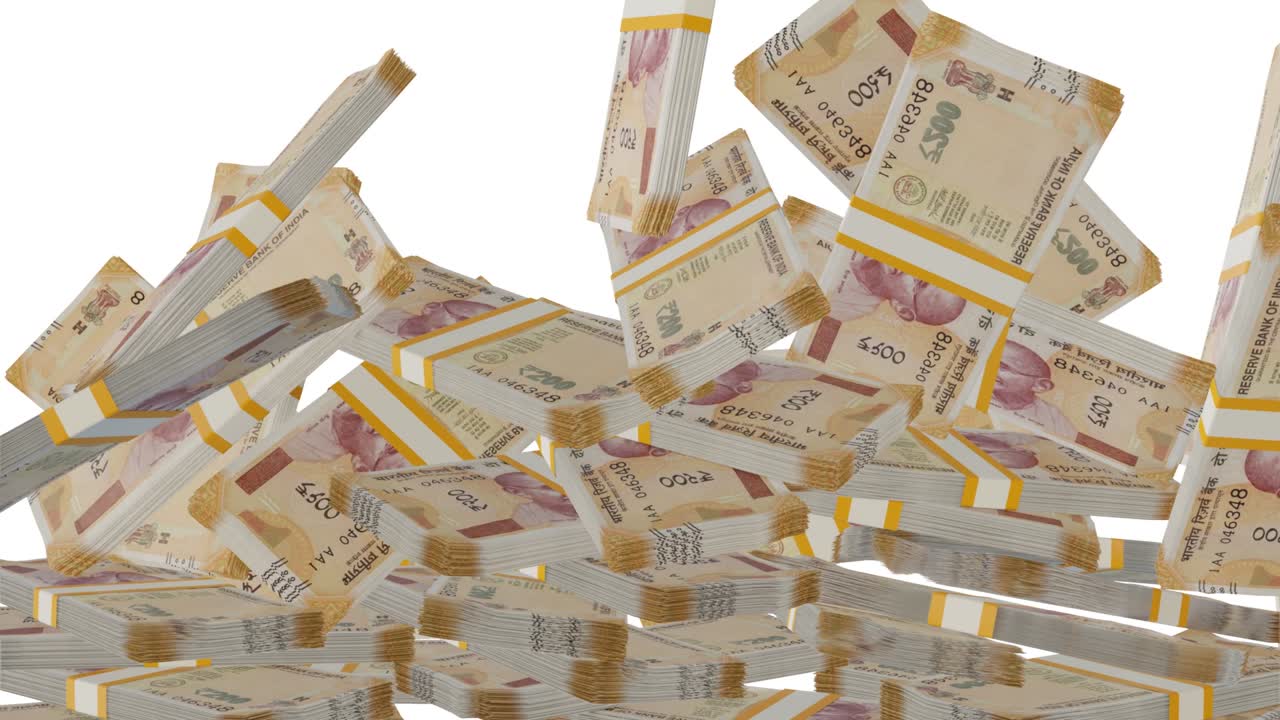 Many wads of money falling on table. 200 Indian Rupees banknotes.