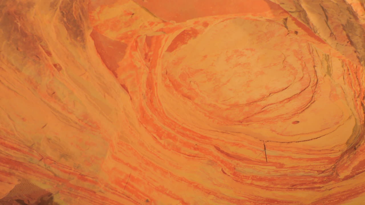 Intricate Swirls of Orange Rock Formation