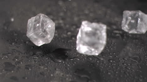 ice cubes hitting ground in super slow motion