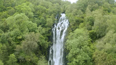 Aerial-Towards-Cascading-Waterfall-At-Glenelg-In-Scotland