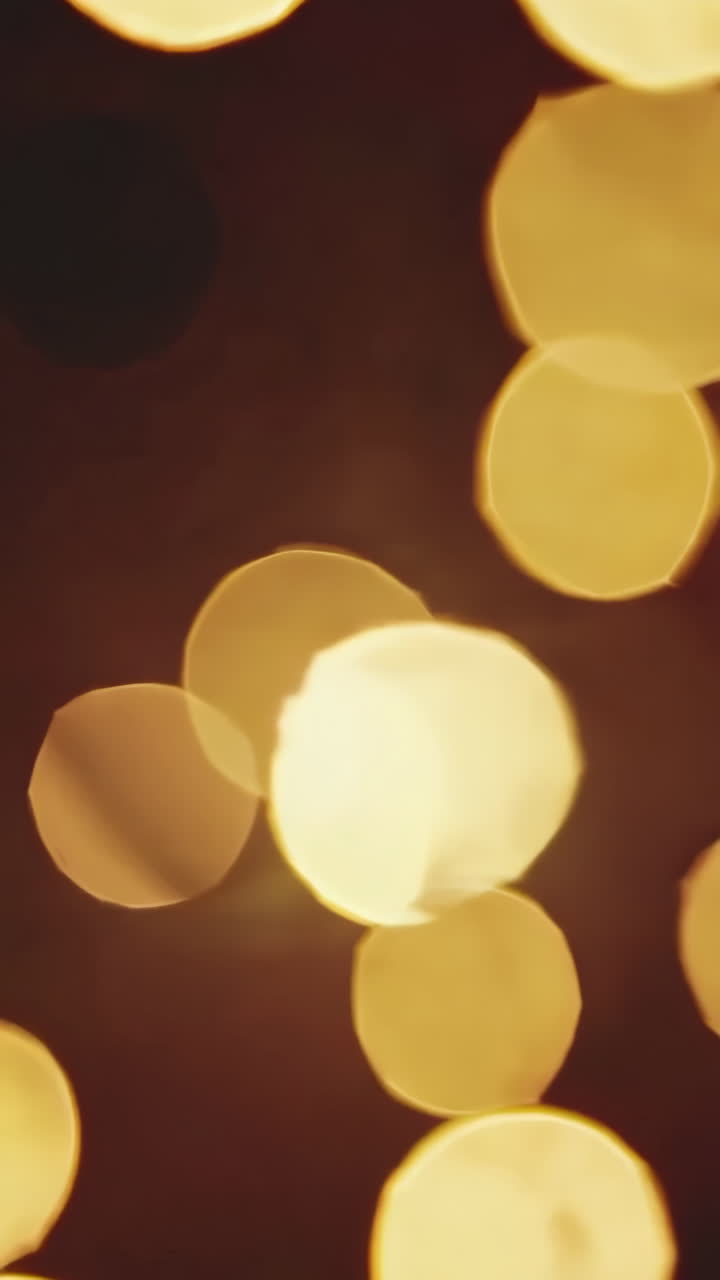 Warm Golden Bokeh Lights on a Dark Background