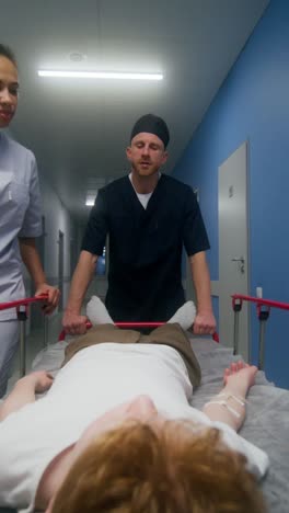 hospital corridor scene with medical personnel and patient