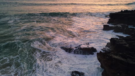 stormy sea landscape splashing aerial view. grey tsunami waves covering rocks