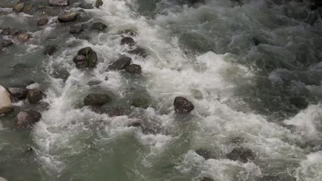 Fast-flowing-water-rapids-cascading-down-a-rocky-river