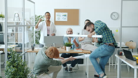 happy office team celebrating