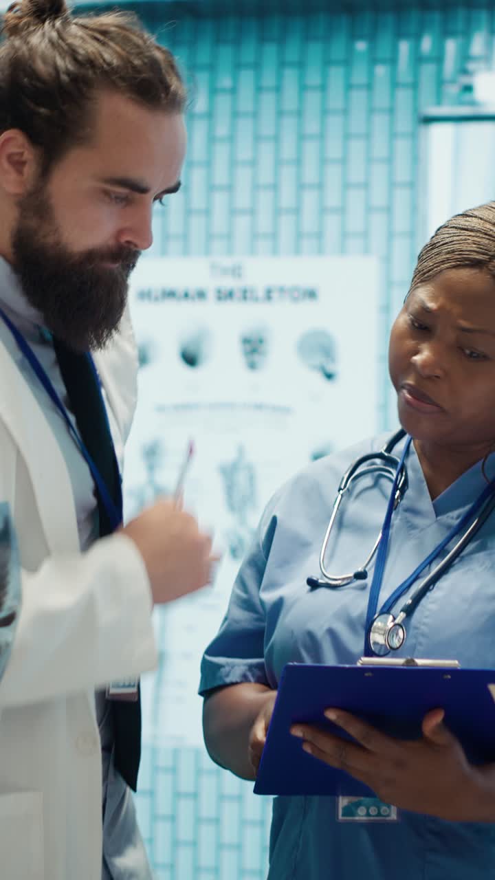 Vertical Video Doctors and radiologists review human anatomy scans to develop treatment service