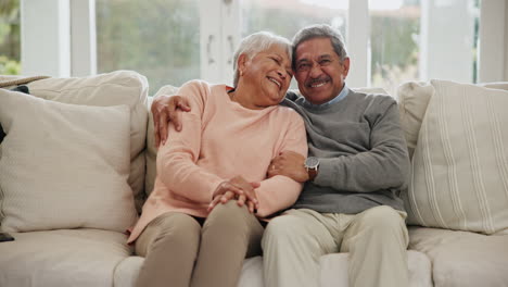 Funny,-home-and-senior-couple-on-a-couch