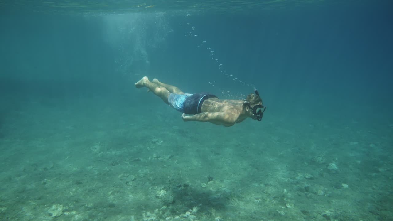 Man Snorkeling Underwater