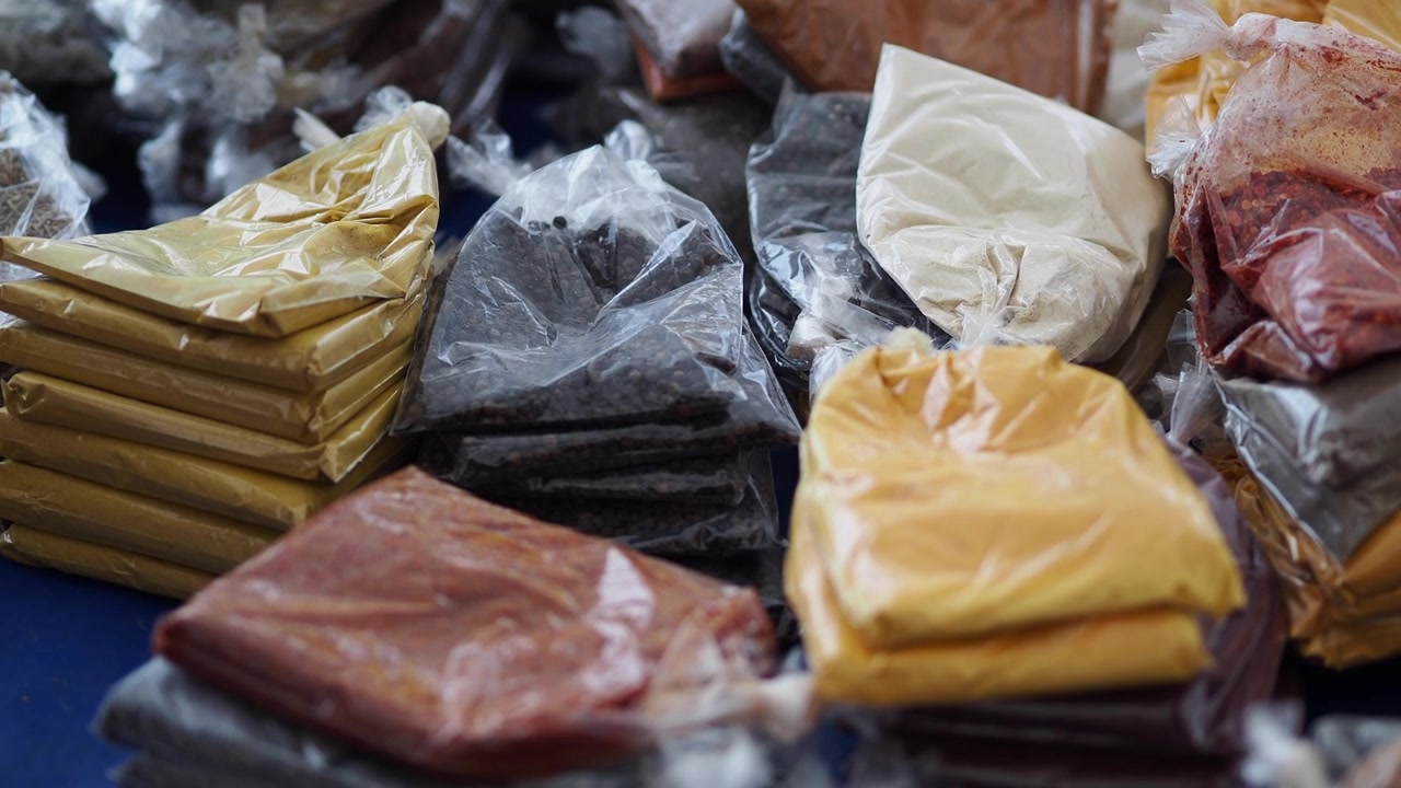 Close-up of Assorted Spices and Powders in Plastic Bags