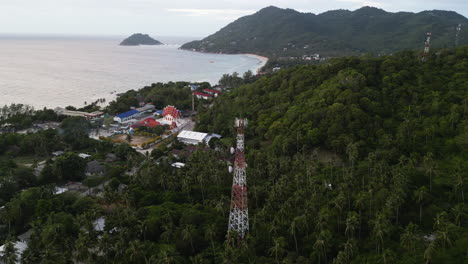 telecommunications tower by a rural tropical coastal town