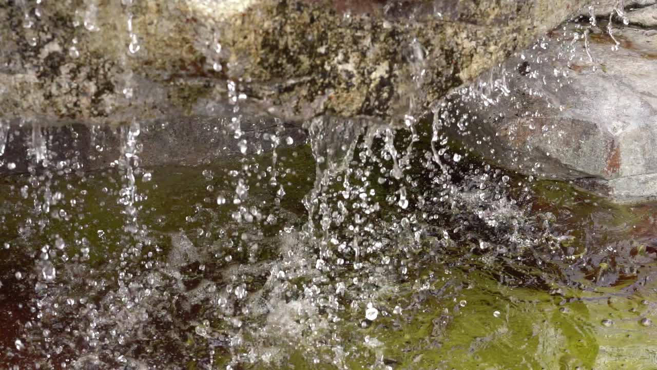 Water Dropping from a fountain