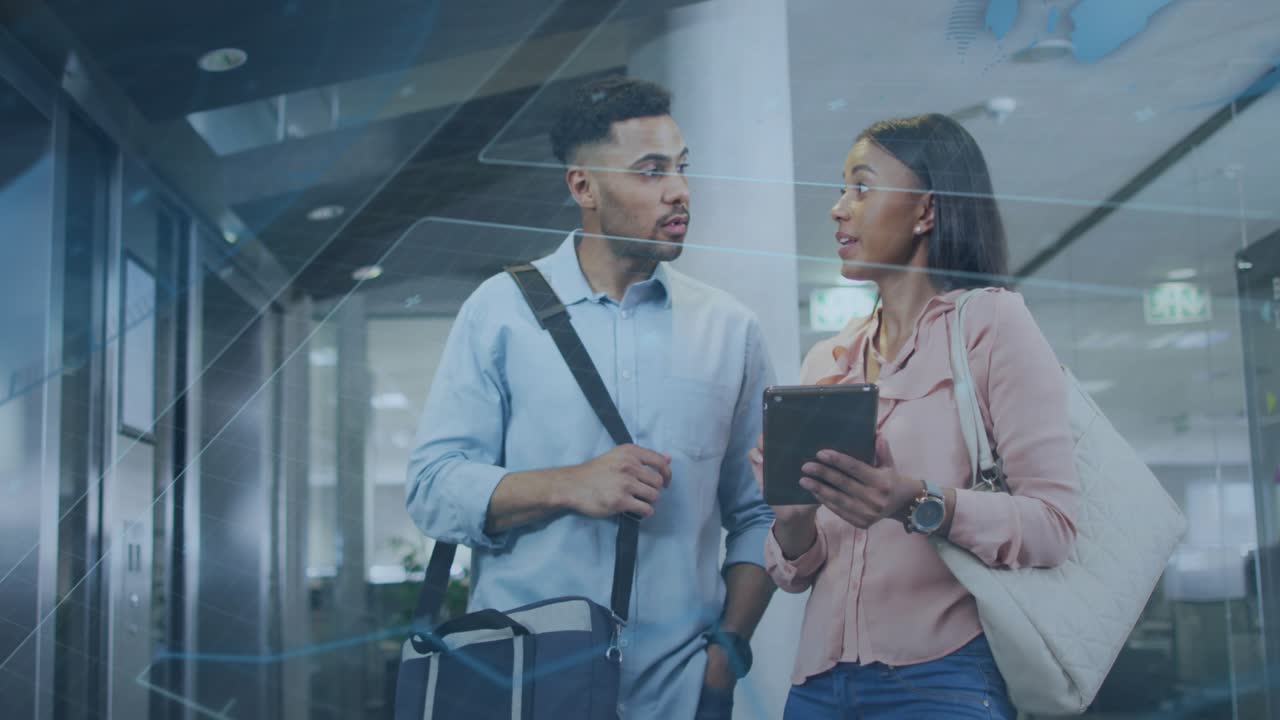 Man approaching woman, woman raising tablet showing travel plan with animated map confirming times