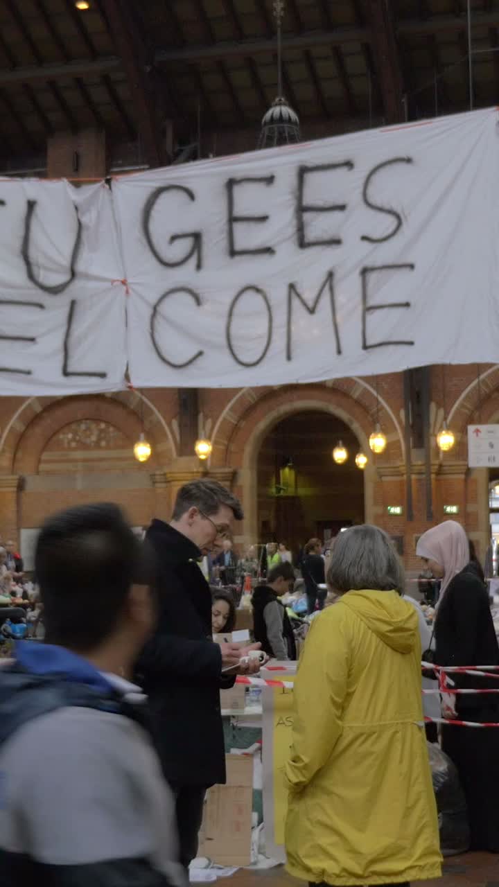 Images of a Refugees Welcome banner