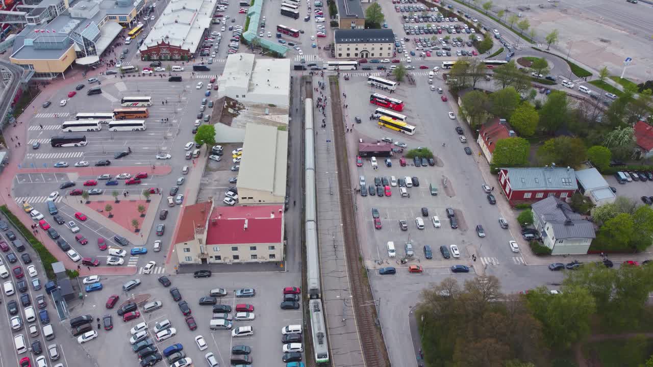 Passenger train arriving at the harbour. Drone shot