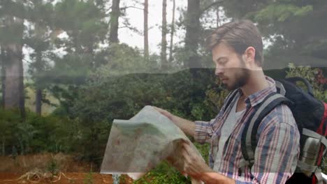 hiker checking his map