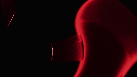 red high heels in the dark