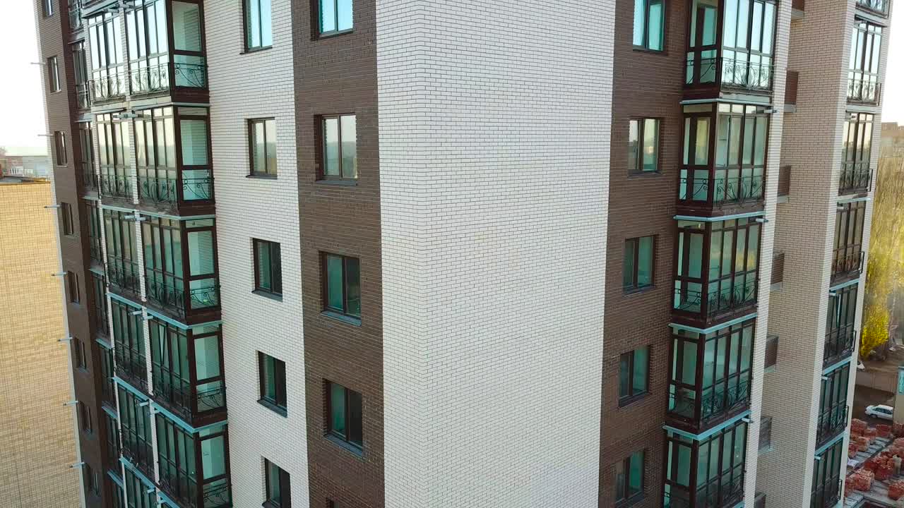 Newly constructed building. Aerial view of building construction site district