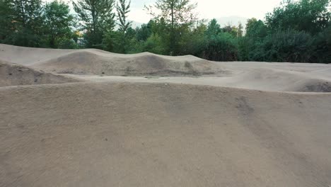 BMX-bike-pump-track-course,-aerial-view