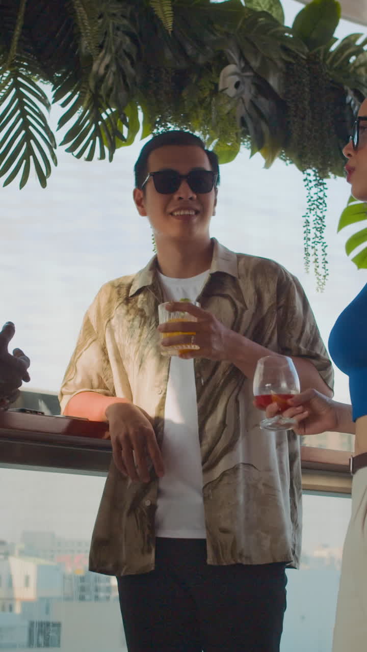 Friends Visiting Trendy Bar with Panoramic Windows