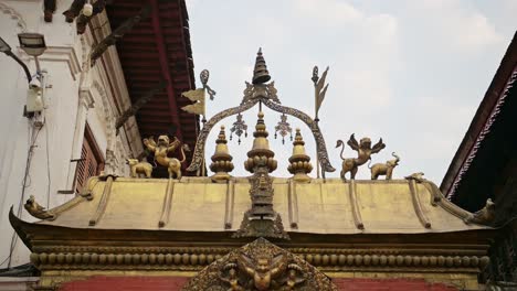 bhaktapur architectural details in nepal, beautiful metal work at a temple with intricate elaborate decorative metalwork in the ancient city of bhaktapur