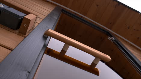 detail shoot of wood door frame from sauna, revealing shoot top to bottom