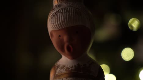 small statue and christmas tree at christmas eve recorded with a sony a7 iii in 4k 30fps