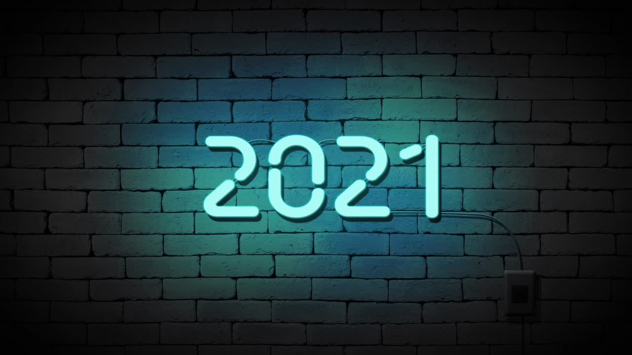 número 2021 signo de neón en el fondo de la pared de ladrillo de piedra. feliz año nuevo y concepto de vacaciones.