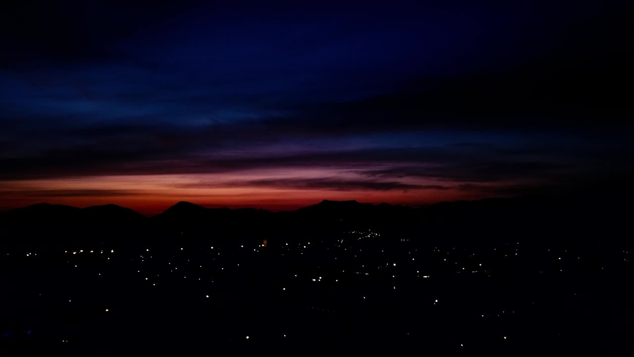 Red sunset over small town called Robertson with mountains in background in South Africa -- DJI Mavic Pro Drone Pan Shot