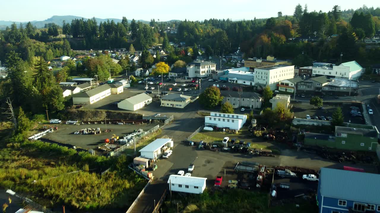US, WA, Cathlamet, 2025-10-22 - Drone view of the docks, boats, and city on a fall morning