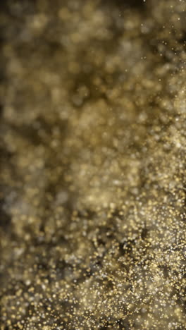 golden shining stars dust bokeh glitter awards dust on abstract background movement flickering yellow particle loop in space on black background. vertical video.