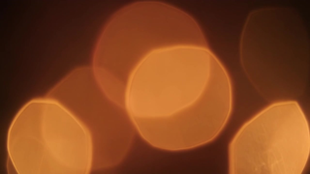 Abstrakter goldener Bokeh-Lichtlecks-Hintergrund