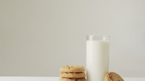video of biscuits with chocolate and milk on white background