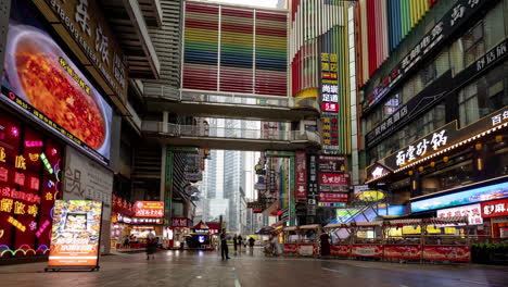 chongqing, china - 28 may 2025 : timelapse of the amazing chongqing cyberpunk city neon street scene in the rain at night