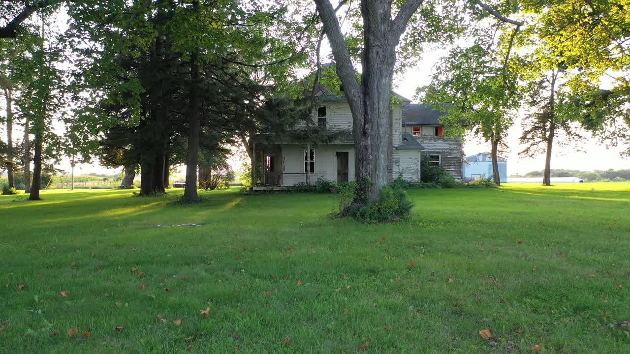 Old Abandoned Farmhouse in Rural Setting