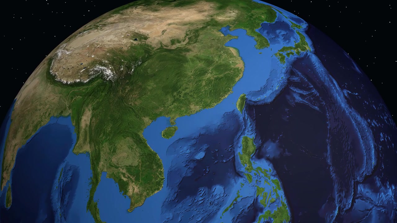 數碼動畫從太空中旋轉的地球縮放至一個標示著香港的位置。
