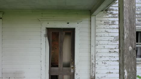 abandoned farmhouse and rural landscape