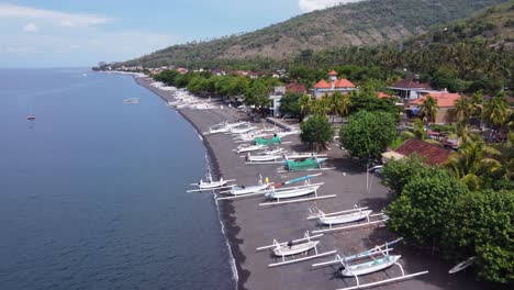 aerial drone view flying over amed village seaside