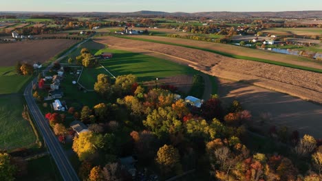 long shadows in autumn season on rural farm fields in pennsylvania usa