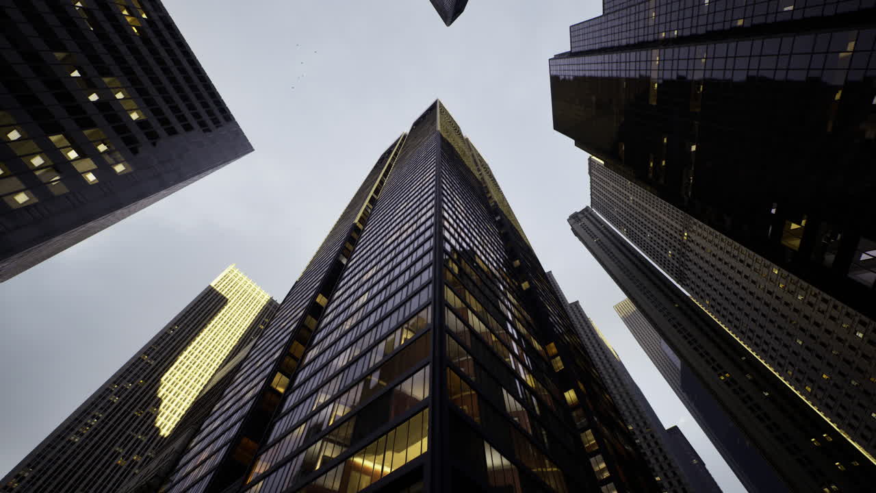 Modern skyscraper rises above city streets under overcast sky
