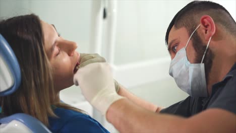 dentist examining patient's teeth